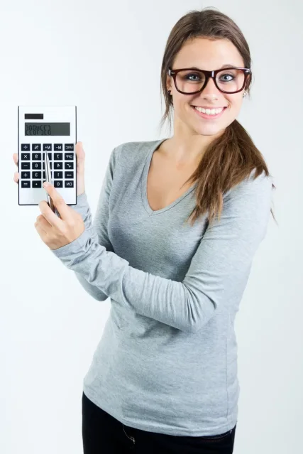 woman-posing-with-calculator-scaled 